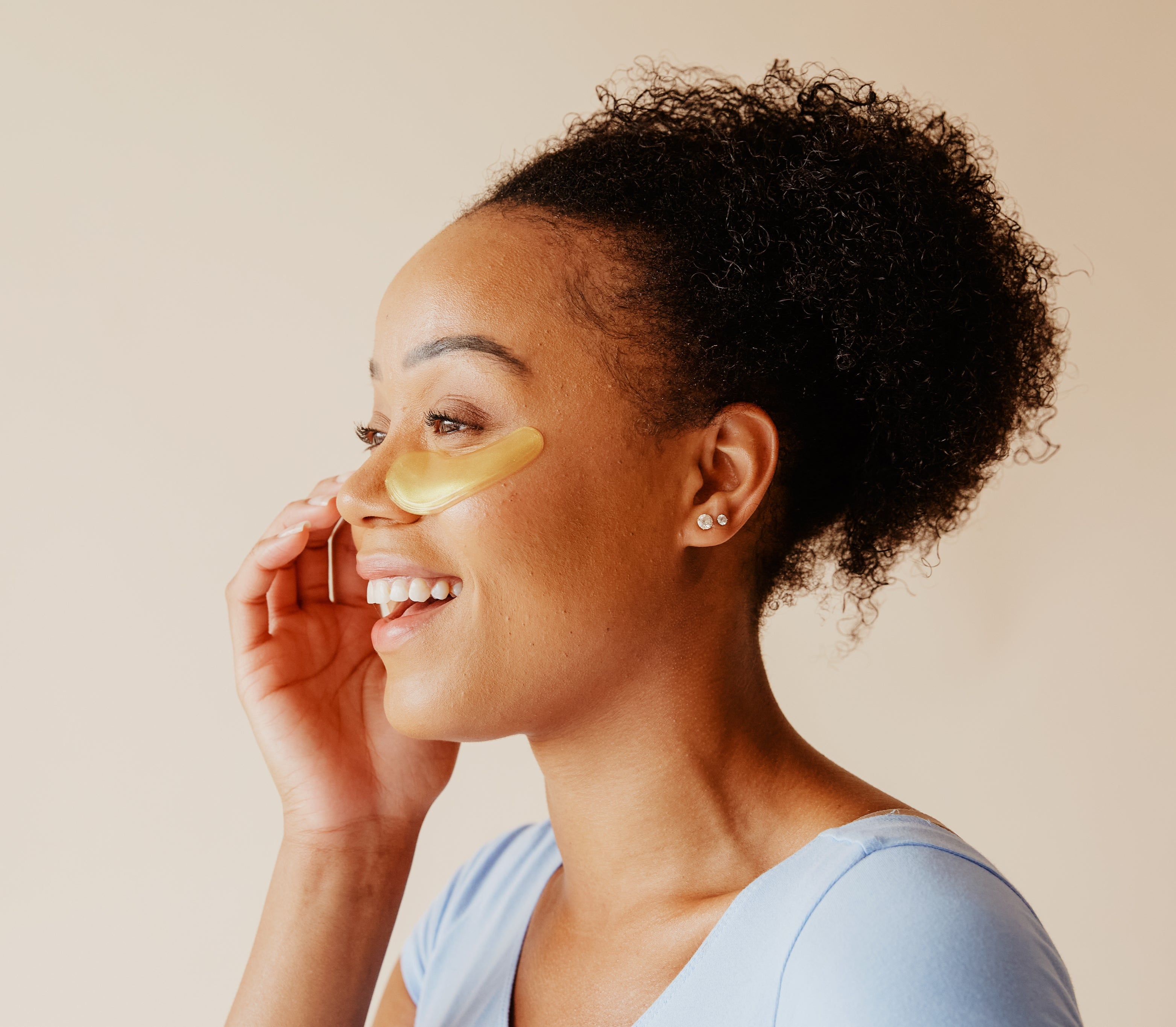 women applying under eye patches for beautiful skin. Eyecare products